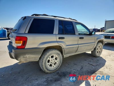 Trzecie zdjęcie samochodu z tyłu: 1999 JEEP GRAND CHEROKEE LAREDO VIN:1J4GW58N6XC739919 - miniatura