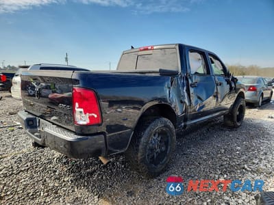 Trzecie zdjęcie samochodu z tyłu: 2018 RAM 1500 SLT VIN:1C6RR7LG0JS260796 - miniatura