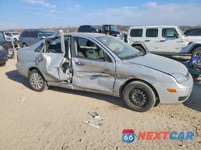 Czwarte zdjęcie samochodu z boku: 2006 FORD FOCUS ZX4 VIN:1FAFP34N86W250479 - miniatura