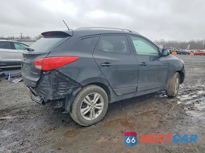 Trzecie zdjęcie samochodu z tyłu: 2012 HYUNDAI TUCSON GLS VIN:KM8JUCAC8CU393547 - miniatura