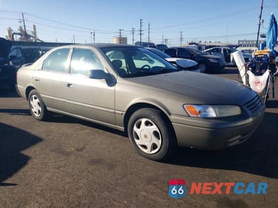 Czwarte zdjęcie samochodu z boku: 1997 TOYOTA CAMRY LE V6 VIN:JT2BF22K0V0039494 - miniatura