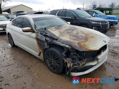 Czwarte zdjęcie samochodu z boku: 2017 BMW 530 XI VIN:WBAJA7C31HG905265 - miniatura