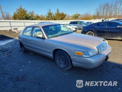 Czwarte zdjęcie samochodu z boku: 1998 FORD CROWN VICTORIA LX VIN:2FAFP74W9WX187901 - miniatura