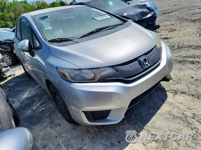 Czwarte zdjęcie samochodu z boku: 2016 HONDA FIT LX VIN:JHMGK5H56GX015799 - miniatura