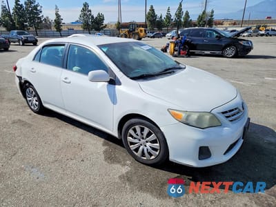 Czwarte zdjęcie samochodu z boku: 2013 TOYOTA COROLLA LE VIN:5YFBU4EE2DP137526 - miniatura