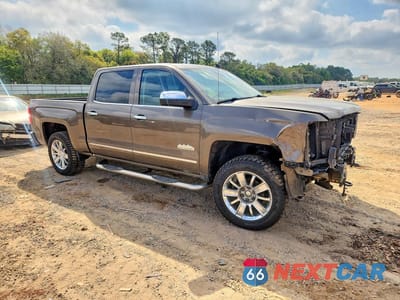 Czwarte zdjęcie samochodu z boku: 2014 CHEVROLET SILVERADO K1500 HIGH COUNTRY VIN:3GCUKTEJ9EG414105 - miniatura