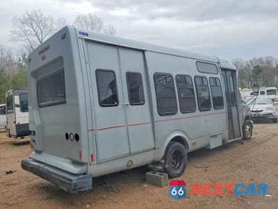 Trzecie zdjęcie samochodu z tyłu: 2003 FORD E450 SHUTTLE BUS VIN:1FDWE45FX3HB18719 - miniatura