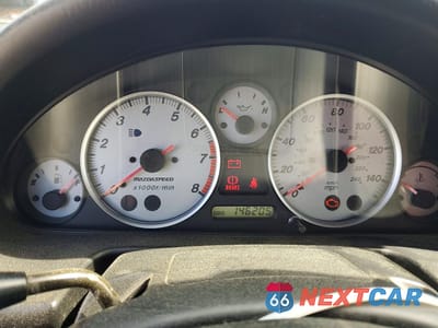 Zdjęcie 9 z 12 samochodu: 2004 MAZDA MX-5 MIATA SPEED VIN:JM1NB354740404724 - miniatura