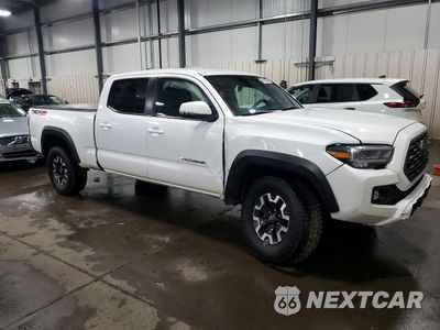 Czwarte zdjęcie samochodu z boku: 2023 TOYOTA TACOMA TRD OFF-ROAD VIN:3TMDZ5BN1PM156519 - miniatura