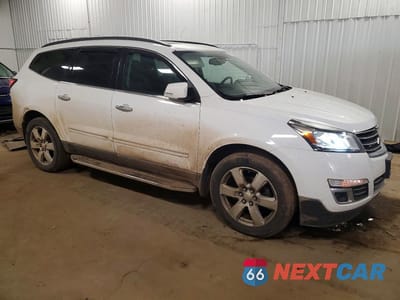 Czwarte zdjęcie samochodu z boku: 2017 CHEVROLET TRAVERSE PREMIER VIN:1GNKVJKD9HJ230875 - miniatura