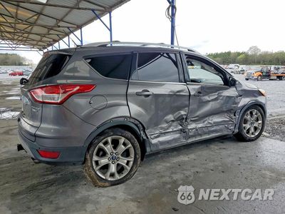 Trzecie zdjęcie samochodu z tyłu: 2014 FORD ESCAPE TITANIUM VIN:1FMCU9J91EUC26627 - miniatura