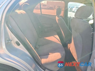 Zdjęcie 10 z 12 samochodu: 2001 TOYOTA COROLLA CE VIN:1NXBR12E11Z542629 - miniatura