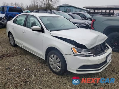 Czwarte zdjęcie samochodu z boku: 2017 VOLKSWAGEN JETTA S VIN:3VW167AJ7HM409346 - miniatura