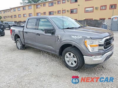 Czwarte zdjęcie samochodu z boku: 2021 FORD F150 SUPERCREW VIN:1FTEW1C5XMKD57326 - miniatura