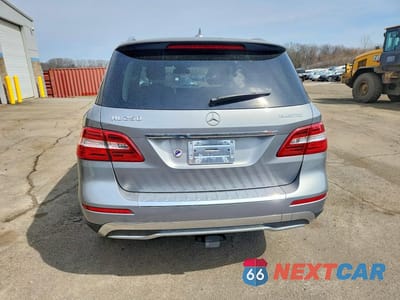Zdjęcie 6 z 13 samochodu: 2015 MERCEDES-BENZ ML 250 BLUETEC VIN:4JGDA0EB0FA518018 - miniatura