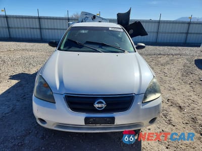 Piąte zdjęcie samochodu w środku: 2002 NISSAN ALTIMA AUTOMATIC VIN:1N4AL11E32C209526 - miniatura