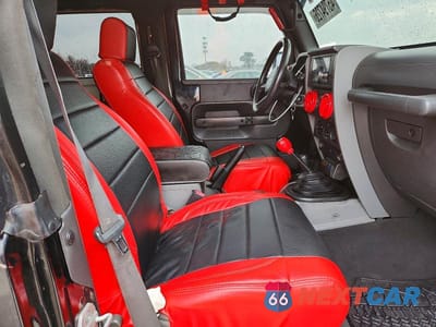 Zdjęcie 11 z 12 samochodu: 2007 JEEP WRANGLER SAHARA VIN:1J4FA54107L228512 - miniatura