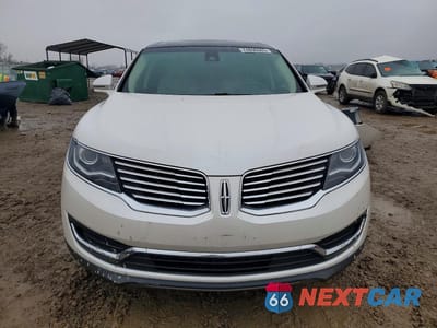 Piąte zdjęcie samochodu w środku: 2016 LINCOLN MKX RESERVE VIN:2LMTJ6LR7GBL80177 - miniatura