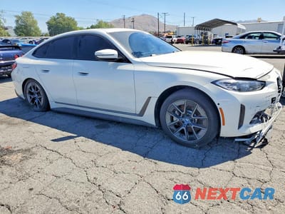 Czwarte zdjęcie samochodu z boku: 2023 BMW I4 EDRIVE 35 VIN:WBY43AW06PFR40668 - miniatura