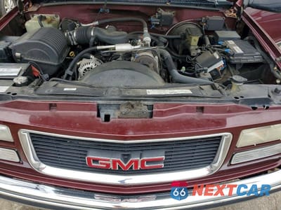 Zdjęcie 11 z 12 samochodu: 1999 GMC YUKON SLE VIN:1GKEK13R5XJ718538 - miniatura