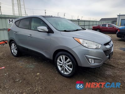 Czwarte zdjęcie samochodu z boku: 2011 HYUNDAI TUCSON LIMITED VIN:KM8JU3ACXBU261498 - miniatura