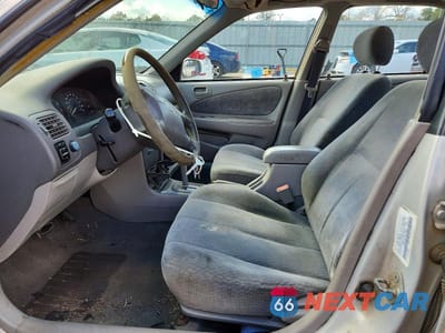 Zdjęcie 7 z 11 samochodu: 2001 TOYOTA COROLLA LE VIN:1NXBR12E71Z517606 - miniatura