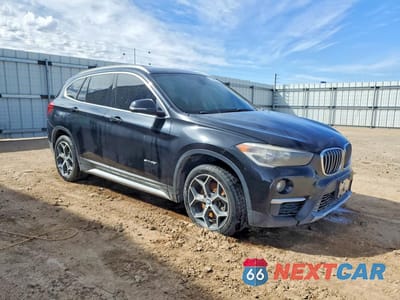 Czwarte zdjęcie samochodu z boku: 2018 BMW X1 SDRIVE28I VIN:WBXHU7C38J5H40833 - miniatura