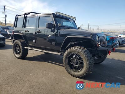 Czwarte zdjęcie samochodu z boku: 2008 JEEP WRANGLER UNLIMITED RUBICON VIN:1J4GA69168L642186 - miniatura