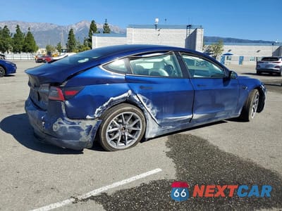 Trzecie zdjęcie samochodu z tyłu: 2021 TESLA MODEL 3 VIN:5YJ3E1EB4MF073409 - miniatura