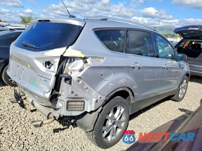 Trzecie zdjęcie samochodu z tyłu: 2014 FORD ESCAPE TITANIUM VIN:1FMCU9J90EUD26377 - miniatura