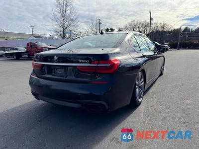 Trzecie zdjęcie samochodu z tyłu: 2017 BMW 750 XI VIN:WBA7F2C58HG422355 - miniatura