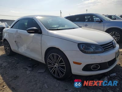 Czwarte zdjęcie samochodu z boku: 2013 VOLKSWAGEN EOS KOMFORT VIN:WVWBW8AH9DV005751 - miniatura