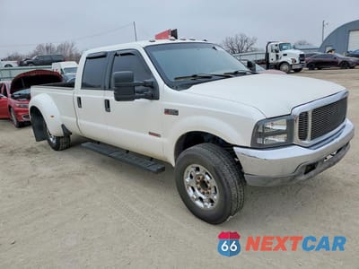 Czwarte zdjęcie samochodu z boku: 2000 FORD F350 SUPER DUTY VIN:1FTWW32F5YEB67464 - miniatura