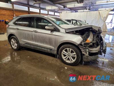 Czwarte zdjęcie samochodu z boku: 2020 FORD EDGE SEL VIN:2FMPK4J93LBA18505 - miniatura