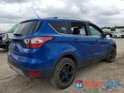 Trzecie zdjęcie samochodu z tyłu: 2017 FORD ESCAPE TITANIUM VIN:1FMCU0JD3HUE94440 - miniatura