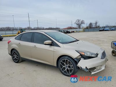Czwarte zdjęcie samochodu z boku: 2017 FORD FOCUS SE VIN:1FADP3FE6HL292903 - miniatura