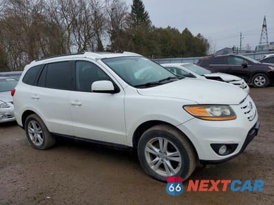 Czwarte zdjęcie samochodu z boku: 2010 HYUNDAI SANTA FE GLS VIN:5NMSGDAG2AH398790 - miniatura