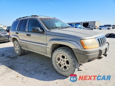 Czwarte zdjęcie samochodu z boku: 1999 JEEP GRAND CHEROKEE LAREDO VIN:1J4GW58N6XC739919 - miniatura