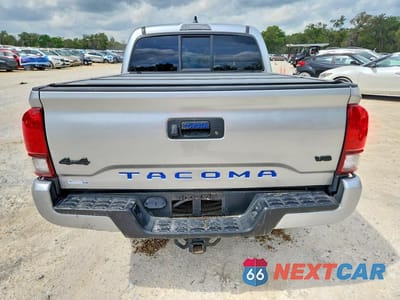 Zdjęcie 6 z 12 samochodu: 2023 TOYOTA TACOMA SR V6 VIN:3TMCZ5AN4PM578698 - miniatura