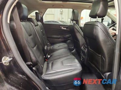 Zdjęcie 10 z 12 samochodu: 2021 FORD EDGE TITANIUM VIN:2FMPK4K98MBA41567 - miniatura