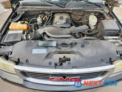 Zdjęcie 12 z 13 samochodu: 2003 GMC YUKON VIN:1GKEC13V43R281301 - miniatura