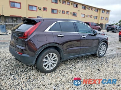 Trzecie zdjęcie samochodu z tyłu: 2021 CADILLAC XT4 LUXURY VIN:1GYAZAR46MF079970 - miniatura