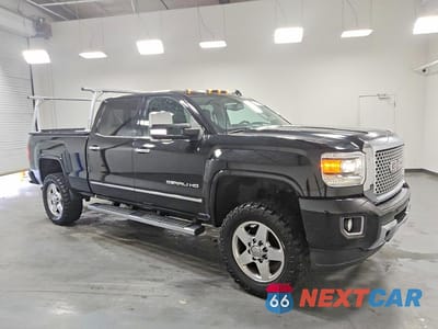 Czwarte zdjęcie samochodu z boku: 2015 GMC SIERRA K2500 DENALI VIN:1GT120EG8FF573609 - miniatura