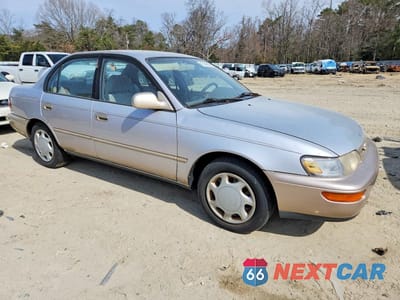 Czwarte zdjęcie samochodu z boku: 1997 TOYOTA COROLLA DX VIN:2T1BB02E5VC181637 - miniatura
