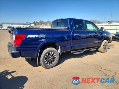 Trzecie zdjęcie samochodu z tyłu: 2017 NISSAN TITAN XD PRO-4X 4WD 5.0L V8 TDSL VIN:1N6BA1F41HN508432 - miniatura