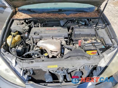 Zdjęcie 11 z 12 samochodu: 2005 TOYOTA CAMRY LE VIN:JTDBE32K253034215 - miniatura