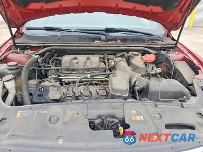 Zdjęcie 11 z 11 samochodu: 2015 FORD TAURUS SEL VIN:1FAHP2E82FG169340 - miniatura