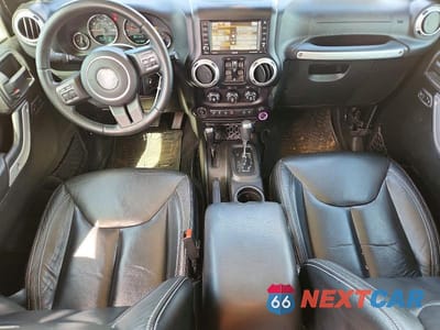 Zdjęcie 8 z 11 samochodu: 2016 JEEP WRANGLER UNLIMITED SAHARA VIN:1C4BJWEG8GL163812 - miniatura