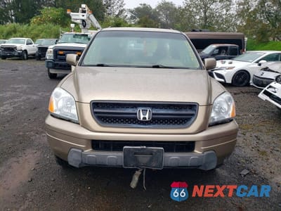 Piąte zdjęcie samochodu w środku: 2004 HONDA PILOT EXL VIN:2HKYF18504H508548 - miniatura
