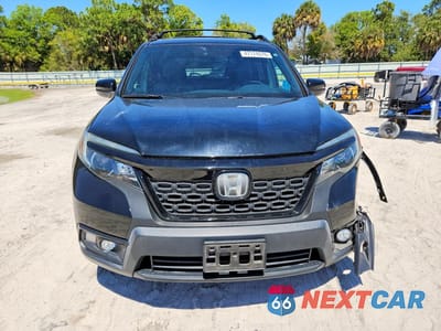 Piąte zdjęcie samochodu w środku: 2019 HONDA PASSPORT EXL VIN:5FNYF8H51KB010590 - miniatura